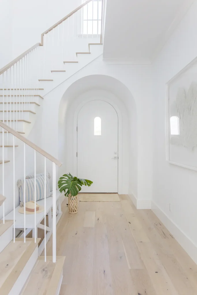 Custom home entry and stairway interior in Ponte Vedra Beach by Alesch Luxury Custom Builders