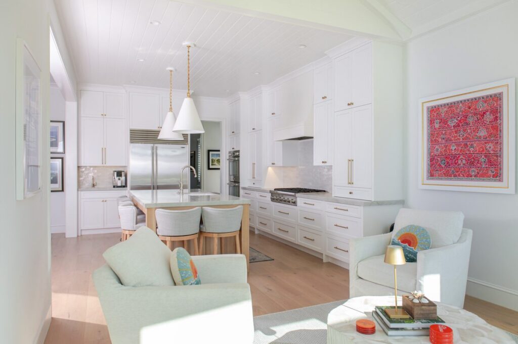 Kitchen opened to the living space in a home renovated by Alesch